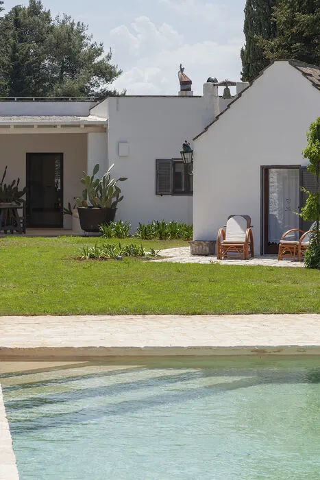 Authentic Apulian chapel surrounded by greenery and private lawn at luxury villa in Puglia